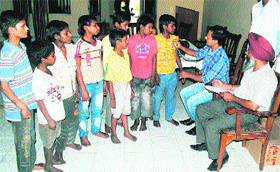 A doctor examines the rescued children in Amritsar on Friday.