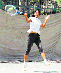 A player in action at the All- India Talent Series Tennis Tournament at Company Bagh in Amritsar on Friday.