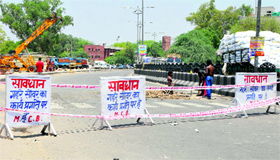 Workers of the Municipal Corporation, Bathinda, busy in a sewerage-related work on the Bathinda-Goniana road on Friday.