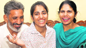 Class XII student (non-medical) Arshdeep Kaur with her parents. 