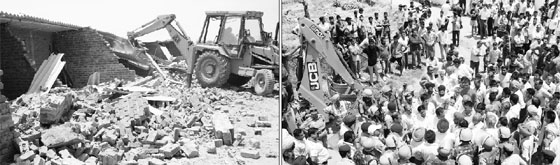 A JCB machine demolishes illegal structures at Kaimbwala village; and (right) policemen try to pacify agitating villagers who blocked the entry point of the village during the demolition drive on Friday.