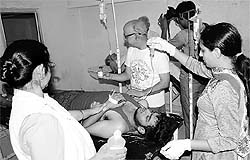 Doctors attend to former bureaucrat RP Singhs grandson, Ashutosh, at Choudhry Bansi Lal General Hospital in Bhiwani on Friday
