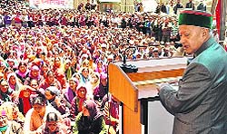 Chief Minister Virbhadra Singh addresses a public meeting at Udaipur in Lahaul-Spiti on Friday