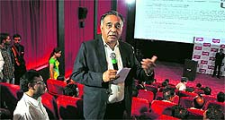 Transport Minister GS Bali addresses the gathering on the inauguration of the SRS Multiplex on the premises of the new bus stand at Tuti Kandi in Shimla on Friday