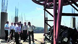 Director Tourism Subhashish Panda, District Commissioner Dinesh Malhotra and Municipal Commissioner Amarjeet Singh inspect work on the ropeway in Shimla on Friday