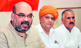 BJP national general secretary Amit Shah (left) addresses a press conference in Jammu on Friday.