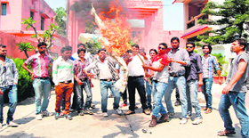 Akhil Bharatiya Vidyarthi Parishad burns effigy of IPL tainted cricketers demanding abolition of IPL in Haridwar on Saturday.