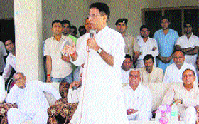 PWD Minister Randeep Singh Surjewala addresses a gathering in Pabnawa on Saturday.