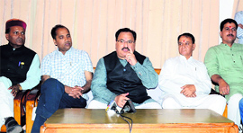 BJP national general secretary JP Nadda (centre) addresses a press conference in Mandi on Saturday.