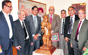Governor NN Vohra being felicitated by the Vice Chancellors of six universities of the state at Raj Bhawan in Srinagar on Friday. 