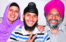 Devinderpal Singh with his parents