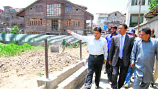 Urban Development and Local Bodies Minister Nawang Rigzin Jora inspects various development projects in Srinagar on Saturday. 