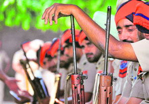 Policemen on duty a day before the elections in Ludhiana on Saturday. 