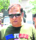 Pune-based businessman Hassan Ali Khan being taken to a court in a money laundering case in Mumbai on Saturday.