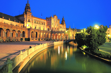  Plaza de Espana Square at night, Seville, Spain. Centuries of Islamic rule has left its mark on the architecture