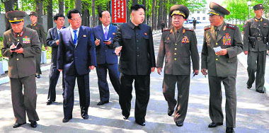 North Korean leader Kim Jong-un (C) visits the February 20 factory of the Korean People's Army in this photo released by North Korea's Central News Agency on Friday.  Reuters