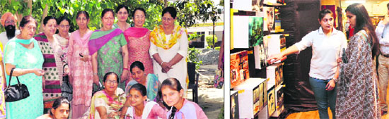 Students along with members of the All India Women's Conference plant a sapling during a biodiversity camp; (right) and a visitor has a look at an exhibition at Springdales Senior Secondary School in Amritsar. 