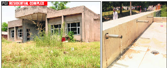 Wild growth in the lawn; stolen taps; and construction material stored in a room with damaged walls at the community centre of PGI residential complex in Sector 12, Chandigarh. 