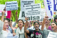 Teachers of Jamia Millia Islamia, JNU and various student organisations protest against the Four Year Undergraduate Programme at Delhi University in New Delhi on Sunday.