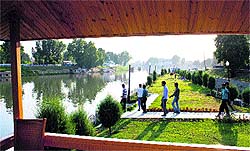 People stroll on the Jhelum bund in Srinagar