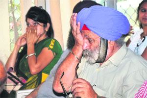 The audience watching the play. 