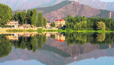 A view of Brari Nambal Lagoon and the Zabarwan range in Srinagar on Sunday.