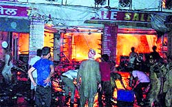 People try to douse the flames in Jagraon on Saturday night