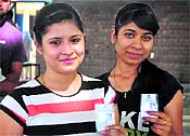 Two first-time enthusiastic voters at Threeke village