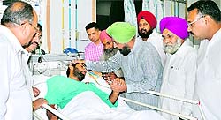 PPCC president Partap Singh Bajwa visits the DMCH to enquire about the well-being of Rajwnder Singh, who was injured in an attack at Bathinda