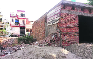 A portion of the building has been illegally constructed at Basant Vihar. 