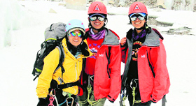 Twin sisters from Dehradun Tashi and Nungshi with Samina, a Pakistani climber, on way to the Mount Everest base camp.