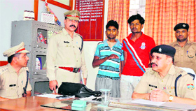 SP (city) KL Shah and circle officer, Kankhal, JR Joshi, inform about the arrest of two in vehicle-lifting cases in Haridwar on Monday.
