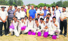 The BHEL team that won the Twenty20 cricket championship in Haridwar on Monday.