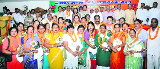 Newly elected councillors of the BJP being felicitated by senior party leaders in Dehradun on Sunday. 