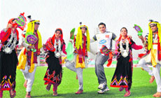 Sohail Khan performs natti with artistes at the HPCA stadium in Dharamsala on Monday.