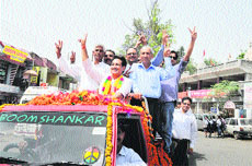 MLA Sohan Lal Thakur with supporters at Sundernagar on Monday. 