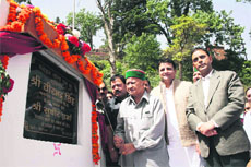 Chief Minister Virbhadra Singh inaugurates a bridge over the Snowdown Nullah in Shimla on Monday.