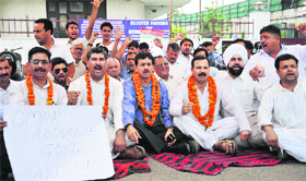 Members of the Panthers Party protest against the state government in Jammu on Monday.