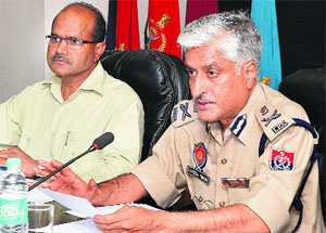 DGP SS Saini (right) and CSR Reddy, ADGP, at a press conference in Chandigarh on Monday. 