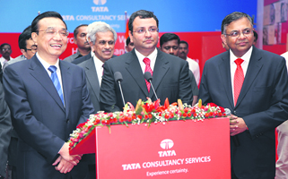 Chinese Premier Li Keqiang (L) with Tata Group chairman Cyrus P. Mistry (C) and TCS CEO & MD Natarajan Chandrasekaran at the TCS centre in Mumbai on Tuesday.
