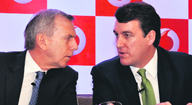 Vodafone India CEO Marten Pieters (L) with CFO Colman Deegan at a press conference in New Delhi on Tuesday.