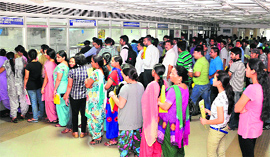 Applicants wait in long queues at the RLA office in Sector 17, Chandigarh, on Tuesday.