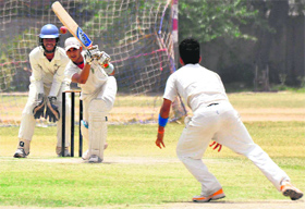 Players in action during a match between Jalandhar and Chandigarh at DAV Senior Secondary School, Sector 8, Chandigarh, on Tuesday.