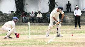 A batsman in action in a match in the All-India Uttarakhand Gold Cup Cricket Tournament in Dehradun on Tuesday.