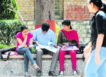 Students at a Delhi University college. Under the Four-Year-Undergraduate Programme, the teaching time has been reduced.