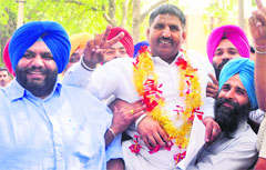 SAD candidate from Alamgir Updesh Singh celebrates his victory in the block samiti poll with his supporters in Ludhiana on Tuesday. Tribune photo: Himanshu Mahajan 