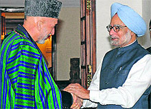 PM Manmohan Singh and Afghan President Hamid Karzai in New Delhi on Tuesday