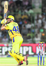 Michael Hussey plays a shot against Mumbai Indians on Tuesday.  PTI