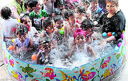 Children enjoy Splash Pool Party at Tribune Model School in Sector 29, Chandigarh, on Wednesday