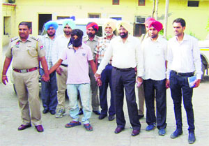 The accused in police custody in Jagraon. 